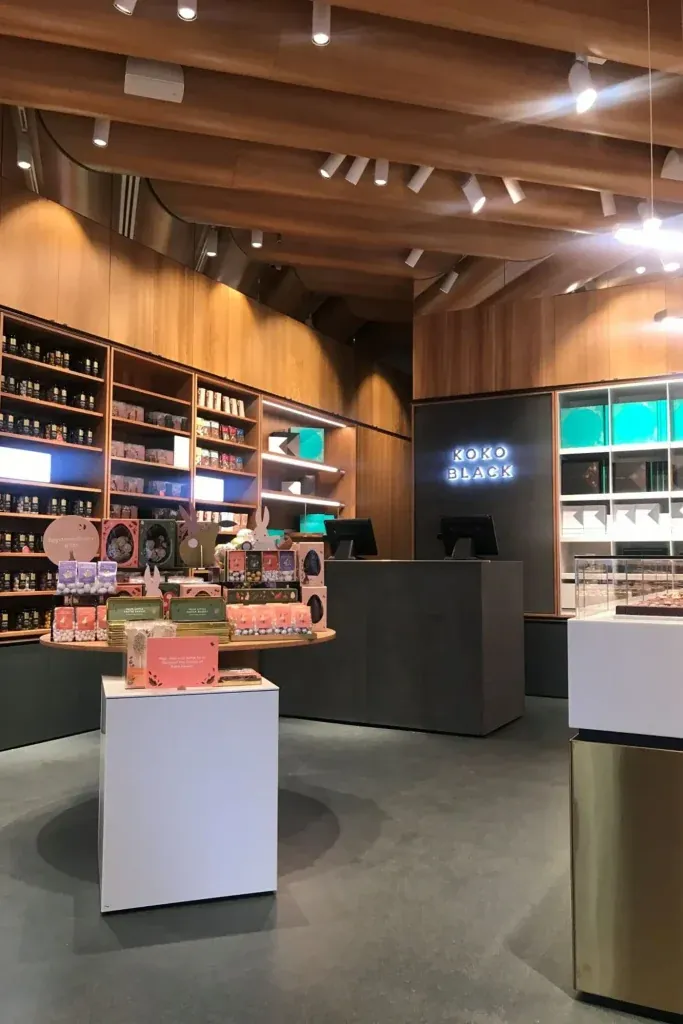 Comcork flooring in a retail store with warm timber finishes